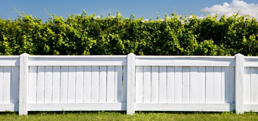 Wood post and wire agricultural fence enclosing rural property in Northbrook IL