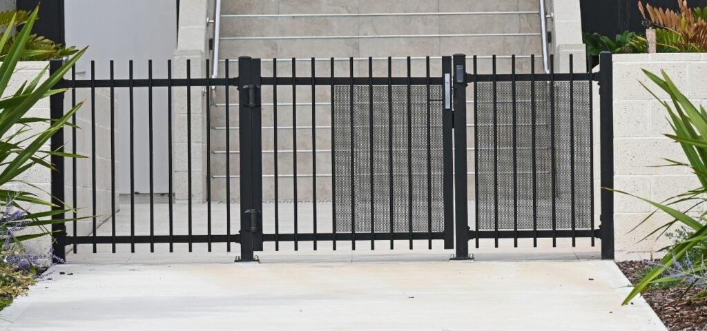 Custom steel entry gate installed in Highland Park IL by Atlantic Fence Inc